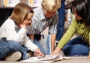 Children learning in a school environment.